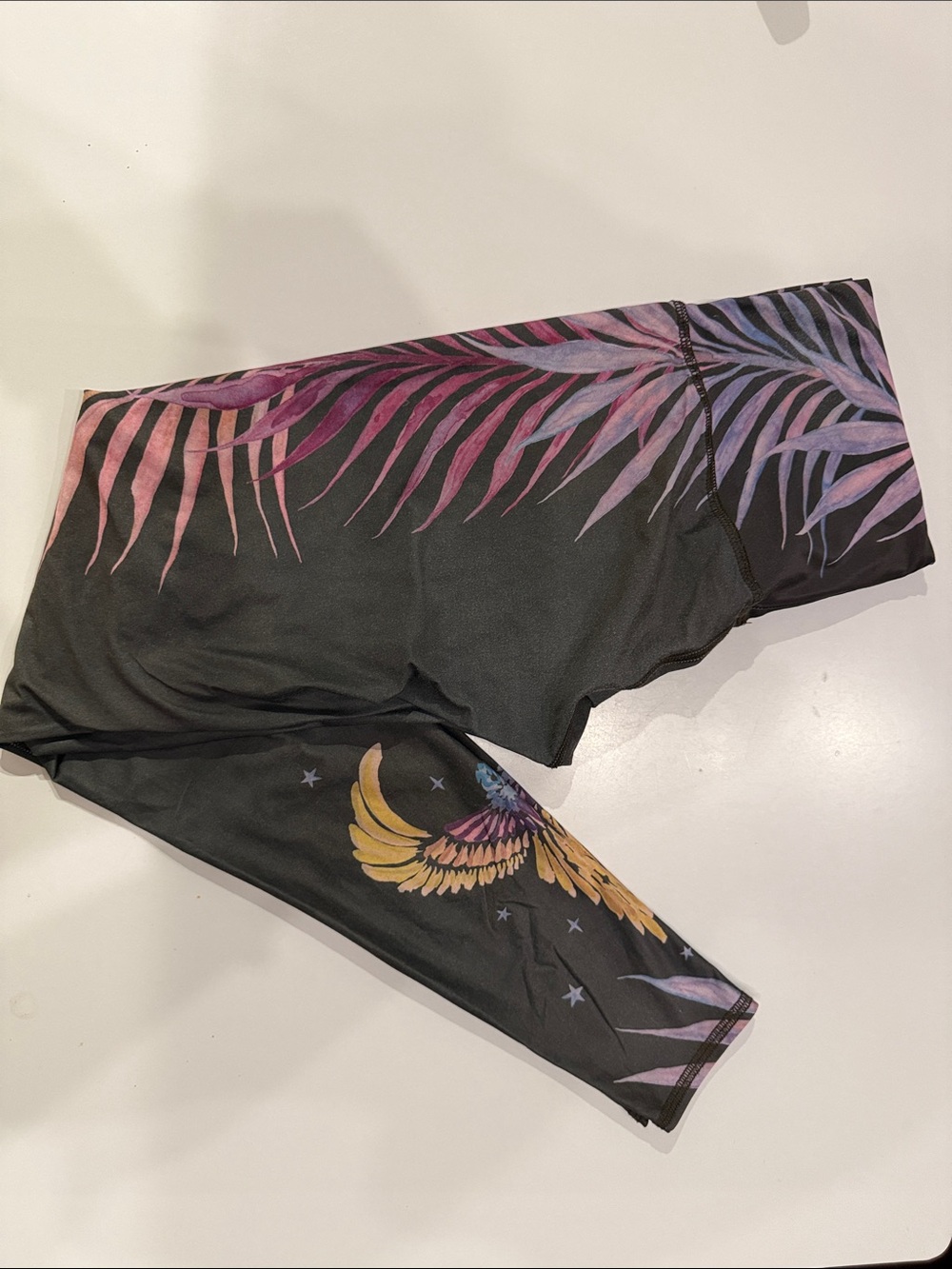 teeki Black Leggings with Purple-Pink Palm Print and Gold Wing Graphic